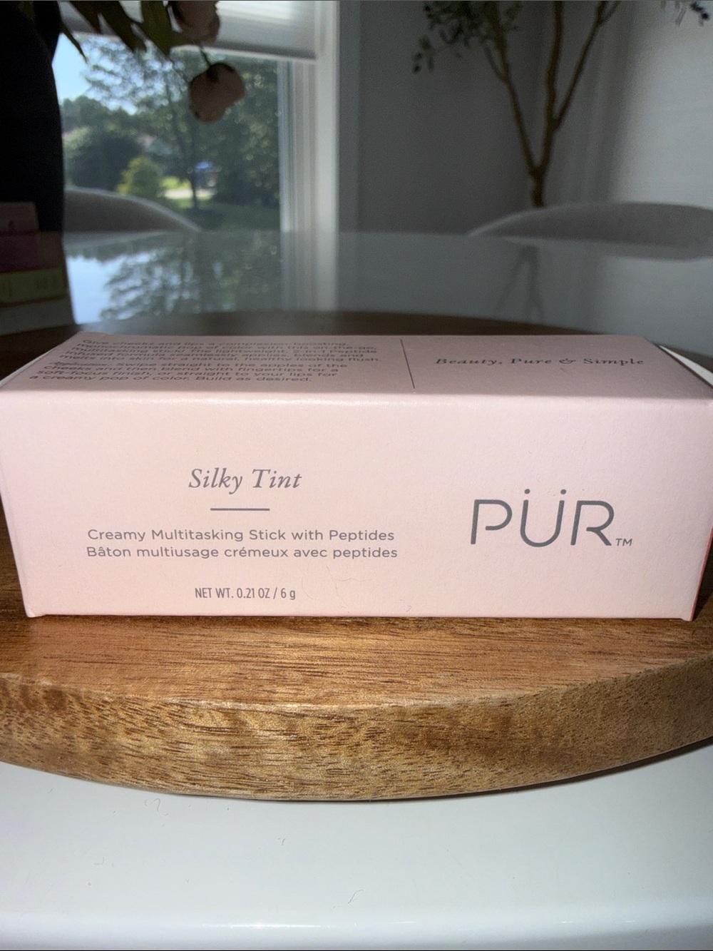 PÜR Silky Tint Creamy Multitasking Stick in Coral Cosmo